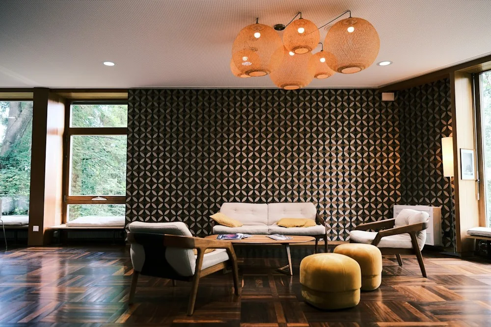 Geometric patterned accent wall in a finished sitting room